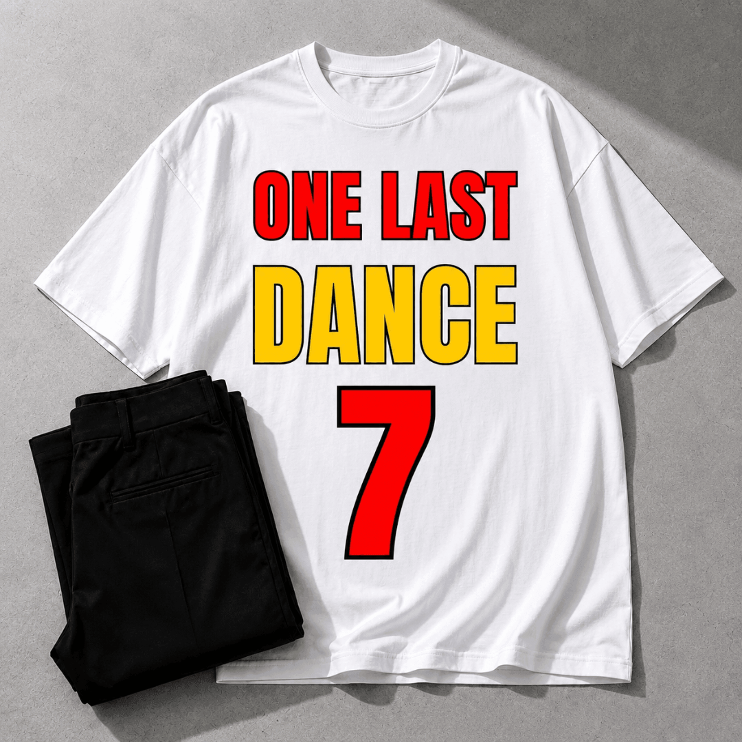 White t-shirt with 'ONE LAST DANCE 7' text on a gray background